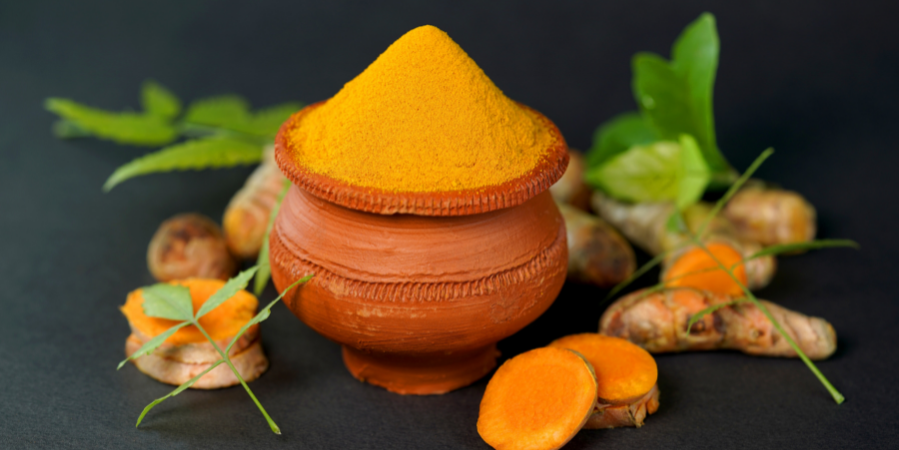 Assuaged-Turmeric-In-Clay-Pot-Image (899 x 450 px)