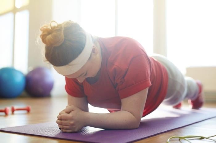 woman-doing-yoga-and-being-healthy