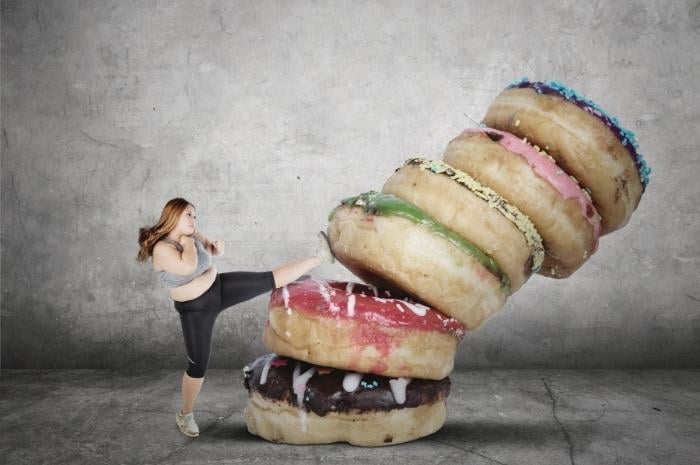 woman-kicking-the-sugar-donuts