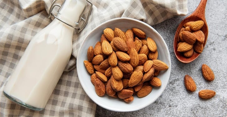 Assuaged-Blog-Almond-Milk-Almonds-In-Bowl-And-Spoon-Image
