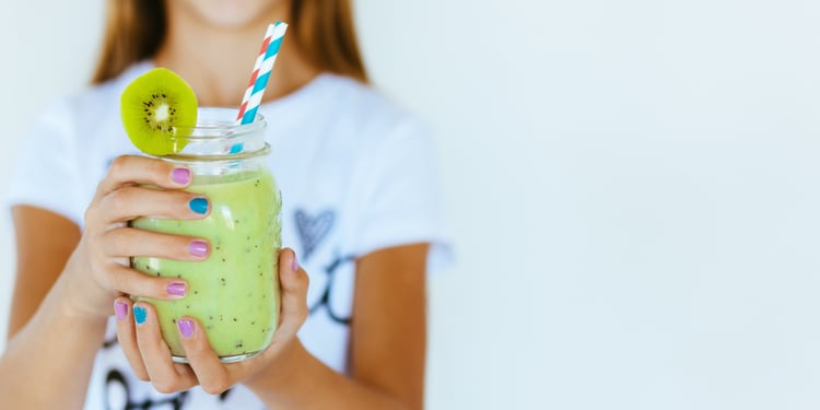 Assuaged-Woman-Drinking-Green-Smoothie-Image