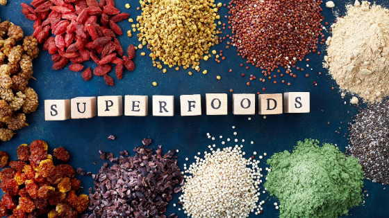 superfoods in block letters with grains and spices
