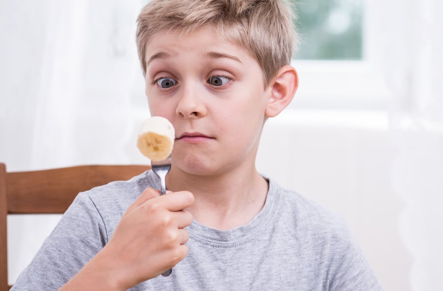 Image of displeased picky eater during lunch