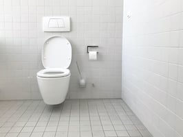 clean white bathroom with toilet