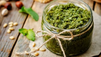 Jar of fresh pesto for Maurizio's Pesto Stuffed Portobello Mushrooms